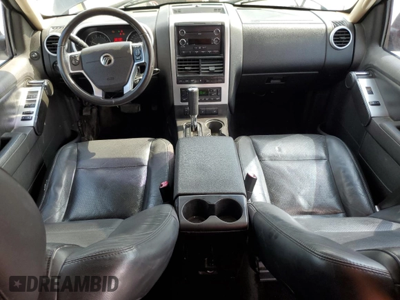 2010 Mercury Mountaineer z VIN 4M2EN3HE2AUJ07385, wystawiony jako Copart lot #51235735 z przebiegiem 174 742 mil mil oraz Szkoda całkowita • Salvage title. Historia ofert i sprzedaży dostępna na DreamBid. Obrazek 8.