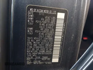 2011 Nissan Juke SL with VIN JN8AF5MV7BT026204, listed as a IAAI auction lot 41476430 with 104,354 mi miles. Bid and sale history available at carsss.com. Image 9.