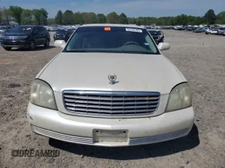 2003 Cadillac DeVille z VIN 1G6KD54Y93U258835, wystawiony jako Copart lot #52595785 z przebiegiem 215 289 mil mil oraz Szkody całkowita. Historia ofert i sprzedaży dostępna na DreamBid. Obrazek 5.