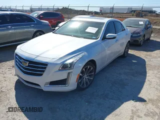 2016 Cadillac CTS with VIN 1G6AR5SS1G0112728, listed as a IAAI auction lot 41830547 with 100,610 mi miles and . Bid and sale history available at DreamBid. Image 17.