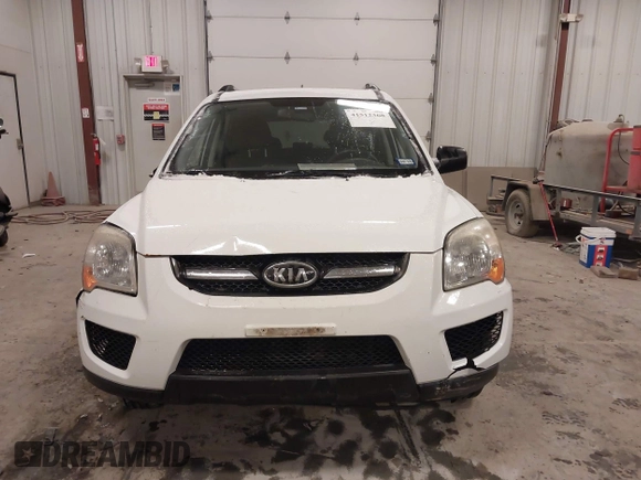 2010 Kia Sportage LX with VIN KNDKGCA35A7718764, listed as a IAAI auction lot 41512368 with 122,420 mi miles and . Bid and sale history available at carsss.com. Image 12.