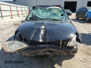 2006 Mitsubishi Lancer ES z VIN JA3AJ26E96U072041, wystawiony jako Copart lot #52852565 z przebiegiem Nie podano mil oraz Szkoda całkowita • Salvage title. Historia ofert i sprzedaży dostępna na DreamBid. Obrazek 5.