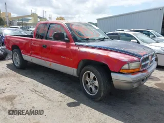 1999 Dodge Dakota SLT z VIN 1B7GL22X9XS135116, wystawiony jako IAAI lot #41922792 z przebiegiem 225 817 mil mil oraz . Historia ofert i sprzedaży dostępna na DreamBid. Obrazek 1.