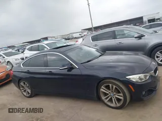 2016 BMW 4 Series 428i z VIN WBA4A9C5XGGL89545, wystawiony jako IAAI lot #41959630 z przebiegiem 61 908 mil mil oraz . Historia ofert i sprzedaży dostępna na DreamBid. Obrazek 13.