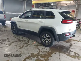 2016 Jeep Cherokee Trailhawk z VIN 1C4PJMBS6GW242123, wystawiony jako IAAI lot #41156712 z przebiegiem 136 596 mil mil oraz . Historia ofert i sprzedaży dostępna na DreamBid. Obrazek 3.