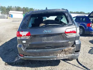 2018 Jeep Grand Cherokee Laredo E with VIN 1C4RJFAG8JC335459, listed as a IAAI auction lot 41850163 with 93,289 mi miles. Bid and sale history available at carsss.com. Image 16.