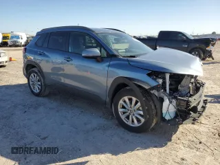 2023 Toyota Corolla Cross LE with VIN 7MUCAAAG8PV060228, listed as a Copart auction lot 86827224 with 40,395 mi miles and Salvage title. Bid and sale history available at DreamBid. Image 4.