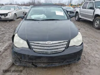 2010 Chrysler Sebring Touring with VIN 1C3BC5ED9AN138508, listed as a IAAI auction lot 41711330 with 93,877 mi miles. Bid and sale history available at carsss.com. Image 12.