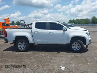 2018 Chevrolet Colorado 4WD LT z VIN 1GCGTCEN3J1108460, wystawiony jako IAAI lot #42543935 z przebiegiem 81 203 mil mil oraz . Historia ofert i sprzedaży dostępna na DreamBid. Obrazek 13.