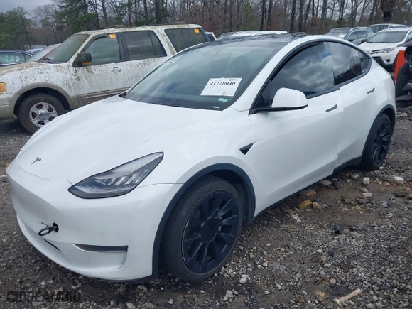 2021 Tesla Model Y Long Range with VIN 5YJYGDEE3MF087054, listed as a IAAI auction lot 41728040 with 64,228 mi miles. Bid and sale history available at carsss.com. Image 19.