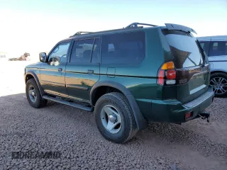 2000 Mitsubishi Montero LS z VIN JA4MT31H0YP015030, wystawiony jako Copart lot #83232584 z przebiegiem 75 294 mil mil oraz Szkoda całkowita • Salvage title. Historia ofert i sprzedaży dostępna na DreamBid. Obrazek 2.