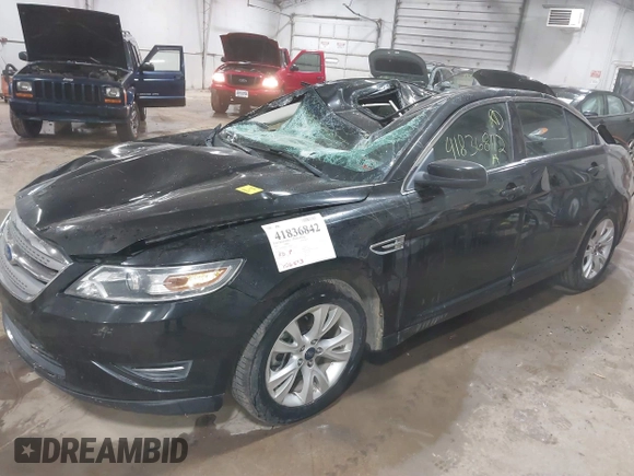 2012 Ford Taurus SEL z VIN 1FAHP2HW2CG144847, wystawiony jako IAAI lot #41836842 z przebiegiem 126 073 mil mil oraz . Historia ofert i sprzedaży dostępna na DreamBid. Obrazek 2.