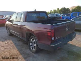 2017 Honda Ridgeline RTL-E with VIN 5FPYK3F74HB029959, listed as a IAAI auction lot 40530840 with 95,596 mi miles. Bid and sale history available at carsss.com. Image 3.