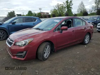 2015 Subaru Impreza Premium with VIN JF1GJAC64FH021628, listed as a Copart auction lot 56842155 with 67,489 mi miles and Salvage title. Bid and sale history available at DreamBid. Image 1.