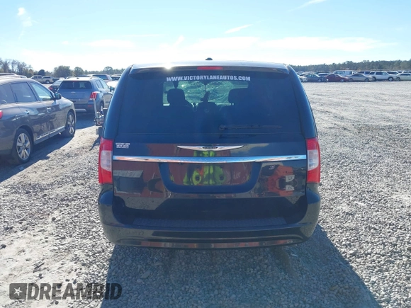 2014 Chrysler Town & Country S with VIN 2C4RC1HGXER225397, listed as a IAAI auction lot 41023867 with 180,093 mi miles and . Bid and sale history available at DreamBid. Image 16.