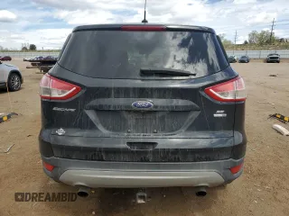 2015 Ford Escape SE with VIN 1FMCU9G96FUC65061, listed as a Copart auction lot 53571625 with 129,048 mi miles and Salvage Title. Bid and sale history available at carsss.com. Image 6.