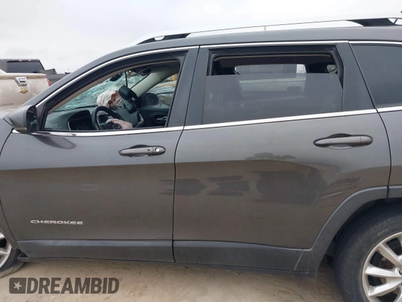 2015 Jeep Cherokee Limited with VIN 1C4PJLDB1FW708157, listed as a IAAI auction lot 41502567 with 85,354 mi miles and . Bid and sale history available at DreamBid. Image 15.