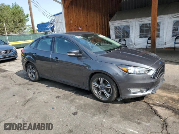 2016 Ford Focus SE z VIN 1FADP3FE7GL238752, wystawiony jako Copart lot #59226335 z przebiegiem 46 289 mil mil oraz Czysty tytuł • Clean title. Historia ofert i sprzedaży dostępna na DreamBid. Obrazek 4.