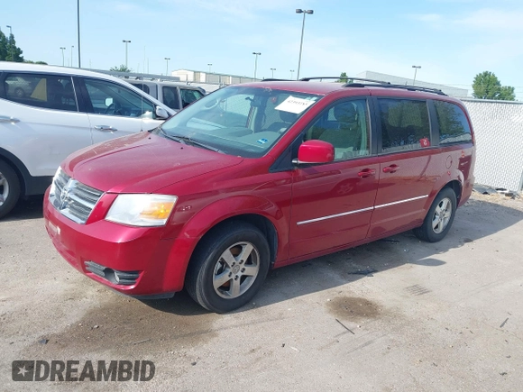 2009 Dodge Grand Caravan SXT z VIN 2D8HN541X9R589227, wystawiony jako IAAI lot #42393785 z przebiegiem Nie podano mil oraz . Historia ofert i sprzedaży dostępna na DreamBid. Obrazek 2.