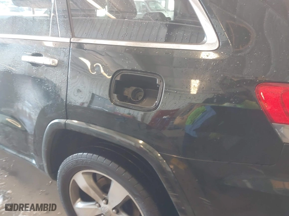 2014 Jeep Grand Cherokee Overland with VIN 1C4RJFCT7EC187319, listed as a IAAI auction lot 41256107 with 98,287 mi miles. Bid and sale history available at carsss.com. Image 6.