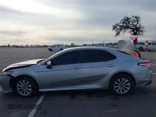 2019 Toyota Camry LE with VIN 4T1B11HK7KU803624, listed as a IAAI auction lot 41589107 with 169,863 mi miles and . Bid and sale history available at DreamBid. Image 14.