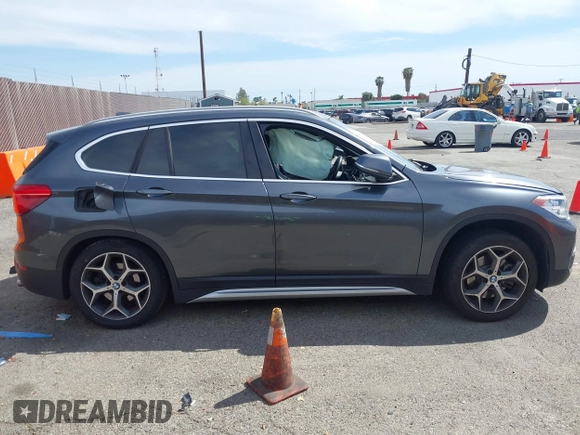 2018 BMW X1 xDrive28i with VIN WBXHT3C30J5L34702, listed as a IAAI auction lot 41935803 with 42,174 mi miles. Bid and sale history available at carsss.com. Image 13.