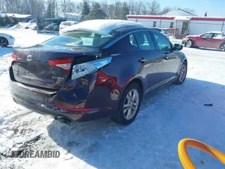 2012 Kia Optima EX with VIN 5XXGN4A61CG069907, listed as a IAAI auction lot 41275805 with 129,050 mi miles and . Bid and sale history available at carsss.com. Image 4.