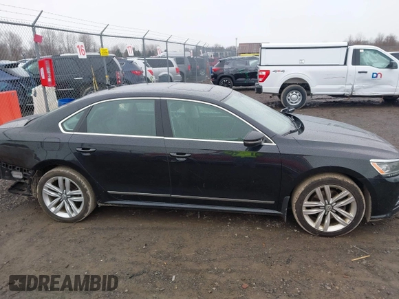 2017 Volkswagen Passat SE z VIN 1VWGT7A30HC031442, wystawiony jako IAAI lot #42008142 z przebiegiem 171 069 mil mil oraz . Historia ofert i sprzedaży dostępna na DreamBid. Obrazek 14.