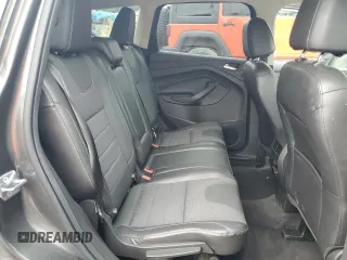 2016 Ford Escape SE z VIN 1FMCU9G95GUC33848, wystawiony jako Copart lot #58191925 z przebiegiem 108 194 mil mil oraz Szkoda całkowita • Salvage title. Historia ofert i sprzedaży dostępna na DreamBid. Obrazek 11.