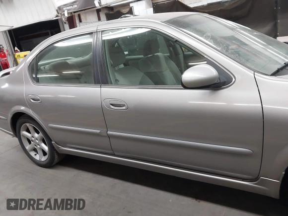 2002 Nissan Maxima GLE with VIN JN1DA31D32T422365, listed as a IAAI auction lot 41644137 with 165,157 mi miles and . Bid and sale history available at DreamBid. Image 13.