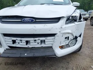 2014 Ford Escape SE with VIN 1FMCU9GX4EUE32062, listed as a IAAI auction lot 42710911 with 68,201 mi miles and . Bid and sale history available at DreamBid. Image 13.