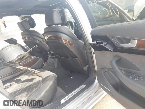 2016 Audi A8 Sport z VIN WAU43AFD0GN011518, wystawiony jako IAAI lot #42096343 z przebiegiem Nie podano mil oraz . Historia ofert i sprzedaży dostępna na DreamBid. Obrazek 8.