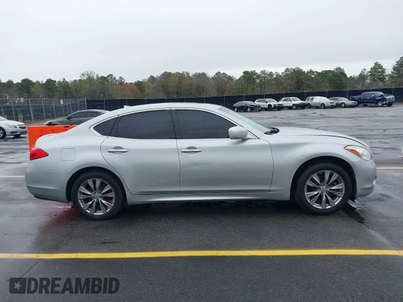 2013 Infiniti M with VIN JN1BY1AP4DM513899, listed as a IAAI auction lot 41854573 with 202,480 mi miles and . Bid and sale history available at carsss.com. Image 13.