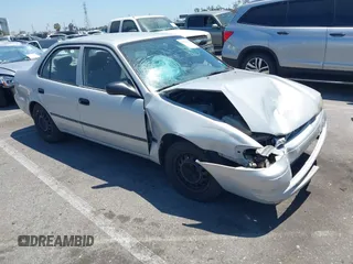 2000 Toyota Corolla VE with VIN 1NXBR12E5YZ417062, listed as a IAAI auction lot 42222575 with 213,986 mi miles and . Bid and sale history available at DreamBid. Image 1.