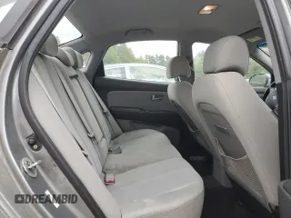 2009 Hyundai Elantra SE z VIN KMHDU46D49U807467, wystawiony jako Copart lot #58783865 z przebiegiem 118 110 mil mil oraz Czysty tytuł • Clean title. Historia ofert i sprzedaży dostępna na DreamBid. Obrazek 10.