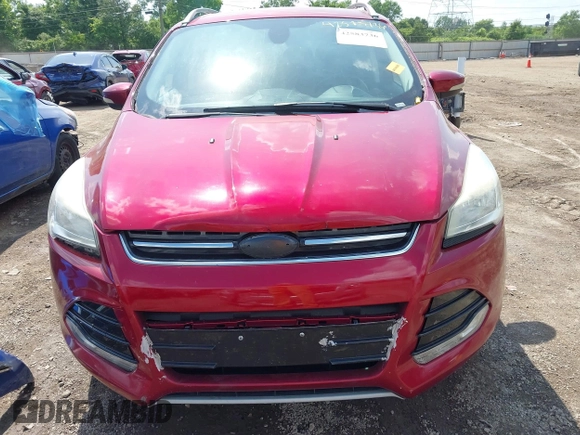 2015 Ford Escape Titanium z VIN 1FMCU9J91FUC58933, wystawiony jako IAAI lot #42583736 z przebiegiem 147 359 mil mil oraz . Historia ofert i sprzedaży dostępna na DreamBid. Obrazek 12.