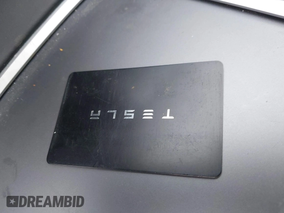 2022 Tesla Model Y Long Range z VIN 7SAYGDEE6NF419332, wystawiony jako IAAI lot #42020974 z przebiegiem 55 680 mil mil oraz . Historia ofert i sprzedaży dostępna na DreamBid. Obrazek 11.
