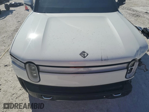 2022 Rivian R1S Launch Edition with VIN 7PDSGABL6NN002520, listed as a Copart auction lot 48323715 with Not Provided miles and Salvage Title. Bid and sale history available at carsss.com. Image 12.