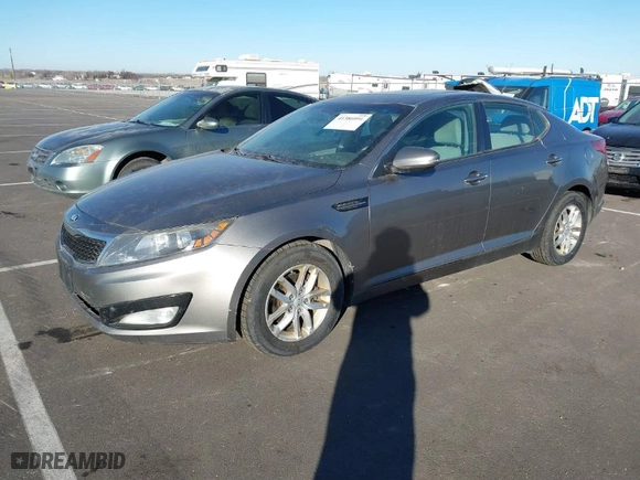 2013 Kia Optima LX with VIN 5XXGM4A72DG251290, listed as a IAAI auction lot 41386091 with 298,306 mi miles. Bid and sale history available at carsss.com. Image 2.