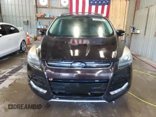 2013 Ford Escape Titanium z VIN 1FMCU9J90DUA98718, wystawiony jako Copart lot #63683005 z przebiegiem 101 036 mil mil oraz Czysty tytuł • Clean title. Historia ofert i sprzedaży dostępna na DreamBid. Obrazek 5.