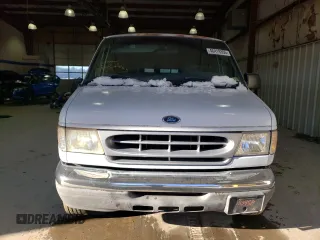 1999 Ford Econoline Passenger XL with VIN 1FBSS31L0XHB37226, listed as a Copart auction lot 46419355 with 51,209 mi miles and Clean Title. Bid and sale history available at DreamBid. Image 5.