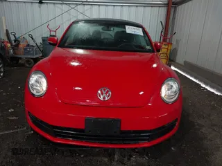 2012 Volkswagen Beetle 2.5L with VIN 3VWJX7AT0CM656148, listed as a IAAI auction lot 41738742 with 53,920 mi miles. Bid and sale history available at carsss.com. Image 12.