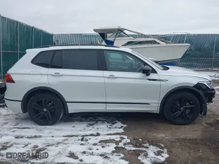 2023 Volkswagen Tiguan SE R-Line Black with VIN 3VVCB7AX6PM132085, listed as a IAAI auction lot 41278065 with 24,333 mi miles. Bid and sale history available at carsss.com. Image 14.