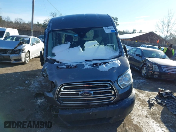 2015 Ford Transit Cargo with VIN 1FTNE2CM5FKB24232, listed as a IAAI auction lot 41333965 with 42,949 mi miles and . Bid and sale history available at carsss.com. Image 11.