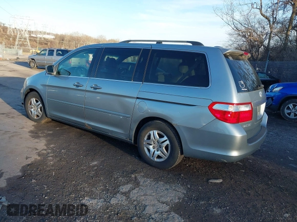 2007 Honda Odyssey EX-L z VIN 5FNRL387X7B081408, wystawiony jako IAAI lot #41143045 z przebiegiem 201 248 mil mil oraz . Historia ofert i sprzedaży dostępna na DreamBid. Obrazek 3.