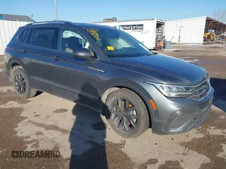 2022 Volkswagen Tiguan SE with VIN 3VV3B7AX1NM147445, listed as a IAAI auction lot 41755217 with 59,399 mi miles and . Bid and sale history available at DreamBid. Image 1.