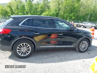 2016 Lincoln MKX Select z VIN 2LMTJ6KR9GBL24307, wystawiony jako IAAI lot #42198439 z przebiegiem 164 199 mil mil oraz . Historia ofert i sprzedaży dostępna na DreamBid. Obrazek 13.