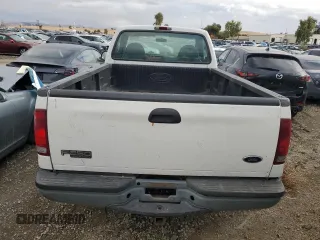 2002 Ford Super Duty F-250 XL with VIN 1FTNF20L02ED31760, listed as a Copart auction lot 79659894 with 236,817 mi miles and Clean Title. Bid and sale history available at carsss.com. Image 6.