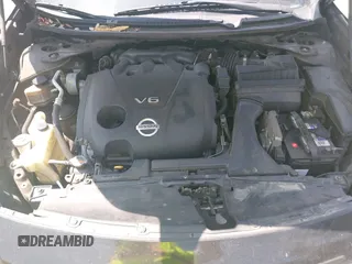 2014 Nissan Maxima S with VIN 1N4AA5AP8EC469519, listed as a IAAI auction lot 42180940 with 119,966 mi miles and . Bid and sale history available at DreamBid. Image 10.