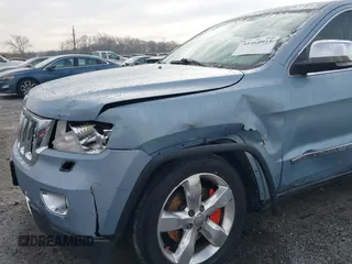 2013 Jeep Grand Cherokee Overland with VIN 1C4RJFCT2DC572978, listed as a IAAI auction lot 41468915 with 223,528 mi miles. Bid and sale history available at carsss.com. Image 6.